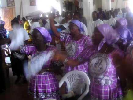 Worshippers praising