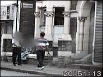 Camera footage of the mobile phone fraudster