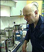 Dad prepares a meal for  14