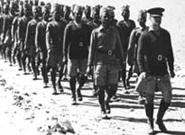 1st March 1940: Indian troops, led by British officers, march out of their  desert camp in Egypt. The Indians were the first of the Empire troops to take  up their station in the Middle East for the North African campaign.(Getty Images/Hulton|Archive)