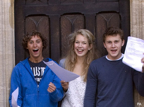 A-level students celebrate their results.