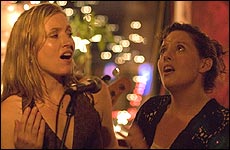 Amy performs with bandmate Fiona McBain