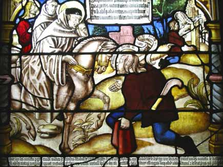 St Bernard on a mule as a peasant kneels before him with his hand outstretched