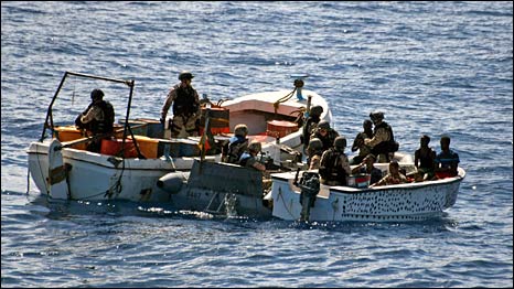 Boarding teams from the German warship Bremen stop two suspected Somali pirate skiffs in the Indian Ocean, 450 nautical miles east of Mogadishu, 20 October 2009