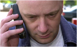 Man talking on mobile phone.