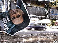 Cartaz de Silvio Berlusconi em Roma