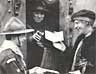Miss Marie Lohr buying a war bond at the tank bank in Trafalgar Square March 1918
