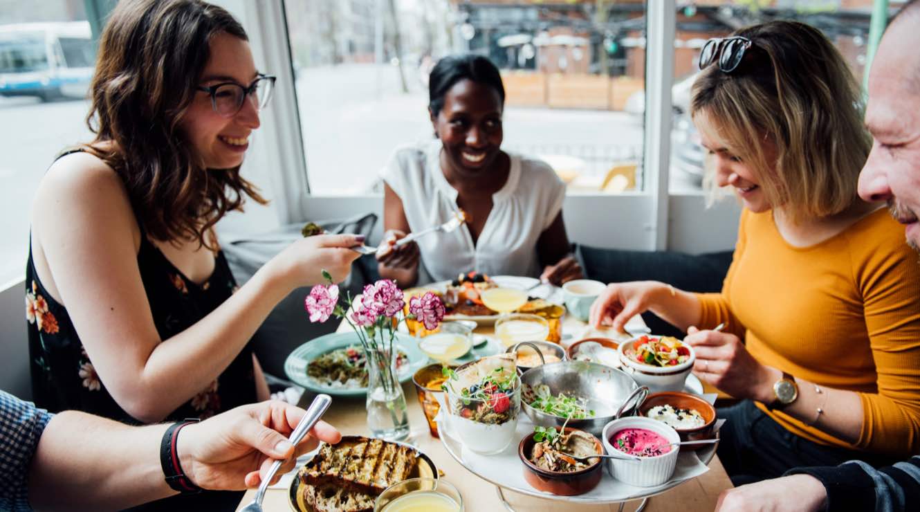 Friends enjoying a meal at a restaurant