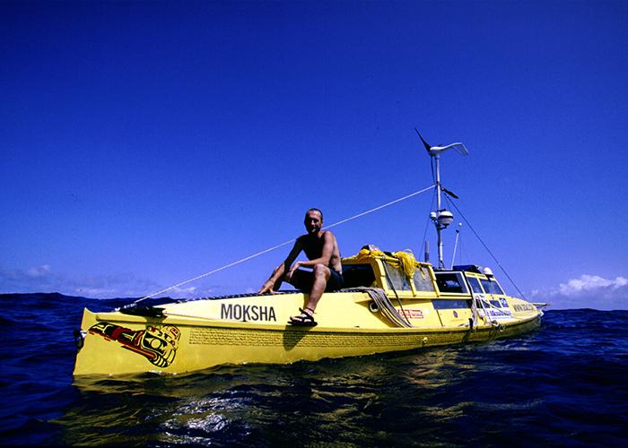 Lewis sits atop his pedal boat in the mid-Pacific, after Smith left the circumnavigation on Hawaii. This was his first time alone – 73 days later he reached the island of Tarawa. Photo © Kenny Brown